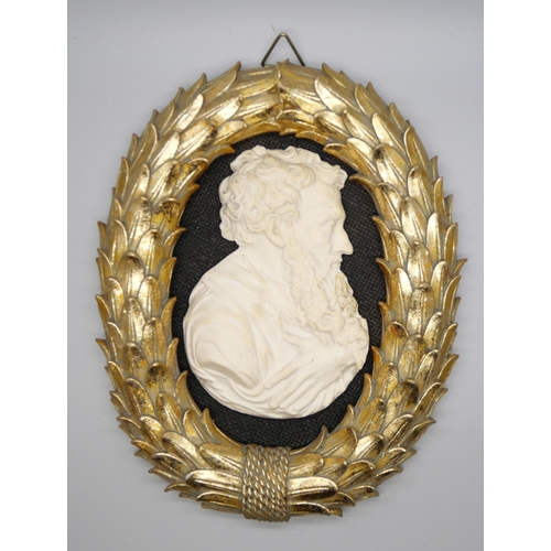 669 - A 19th Century portrait in relief of Sir Peter Paul Rubens in a laurel wreath frame