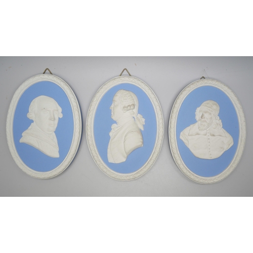 670 - Three Wedgwood blue jasper oval portrait plaques/medallions, including Indigo Jones and George Stubb... 