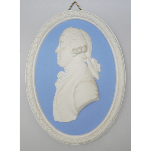 670 - Three Wedgwood blue jasper oval portrait plaques/medallions, including Indigo Jones and George Stubb... 