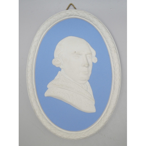 670 - Three Wedgwood blue jasper oval portrait plaques/medallions, including Indigo Jones and George Stubb... 