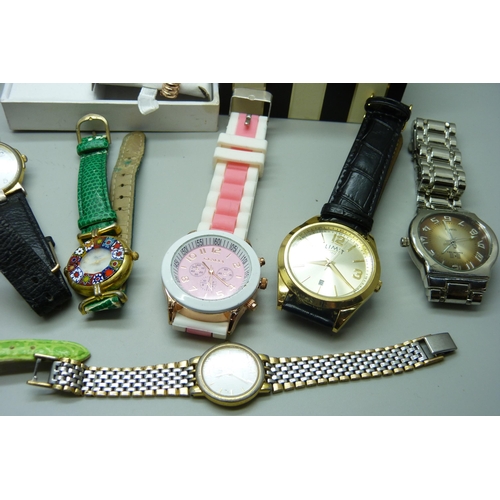 674 - A collection of wristwatches including Fossil and Limit