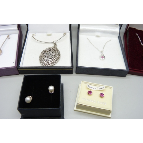 675 - Six silver pendants and chains and four pairs of silver earrings