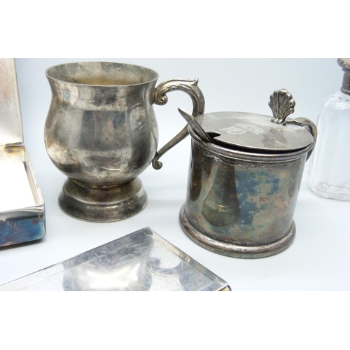 678 - Two silver topped bottles and assorted silver plate