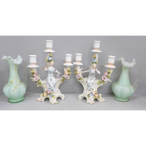 694 - A pair of continental figural candelabra and a pair of glass vases with gilt detail, some petals a/f