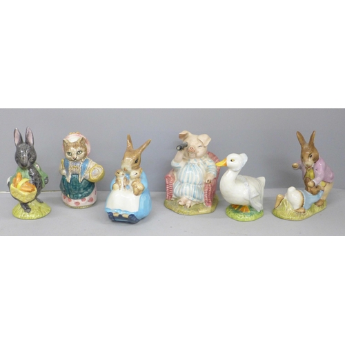 698 - Six Beswick Beatrix Potter figures including Mrs Rabbit with Bunnies, Little Black Rabbit and Cousin... 