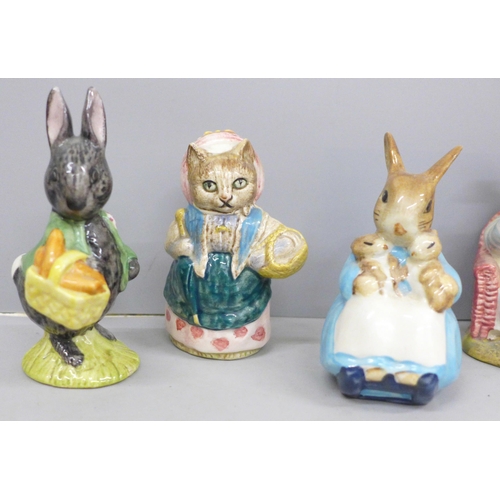 698 - Six Beswick Beatrix Potter figures including Mrs Rabbit with Bunnies, Little Black Rabbit and Cousin... 