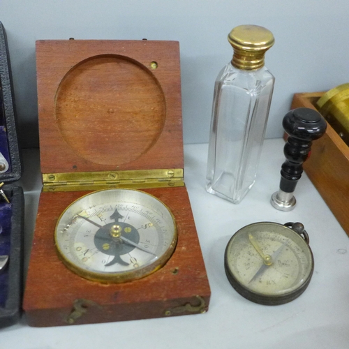 706 - A collection of instruments/tools; a brass microscope, boxed, a leather working tool, two compasses,... 