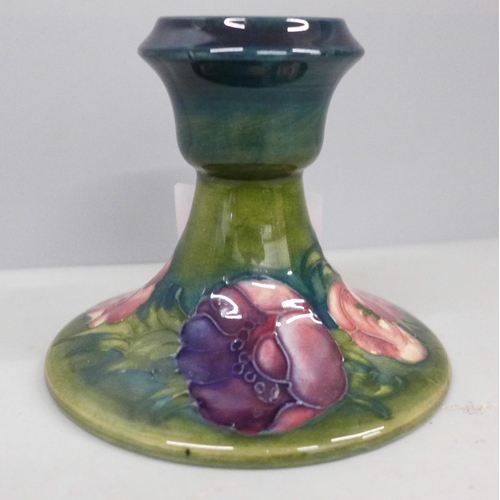 708 - A Moorcroft Hibiscus pattern candlestick