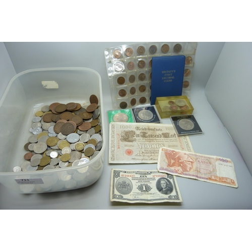 711 - A collection of British and foreign coins and bank notes