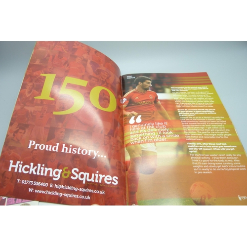 715 - A commemorative 150 Years Nottingham Forest football programme, bearing two signatures