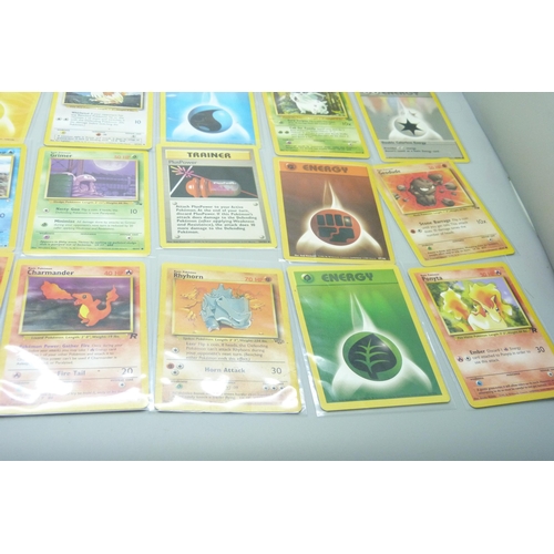 720 - A collection of vintage Pokemon and Digimon cards