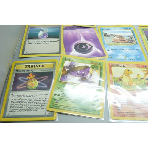 720 - A collection of vintage Pokemon and Digimon cards