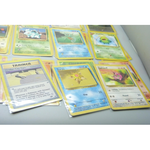 720 - A collection of vintage Pokemon and Digimon cards