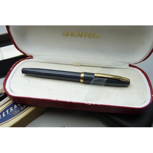 721 - A collection of pens including Waterman, Parker, Sheaffer, etc.