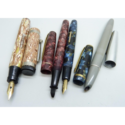 721 - A collection of pens including Waterman, Parker, Sheaffer, etc.