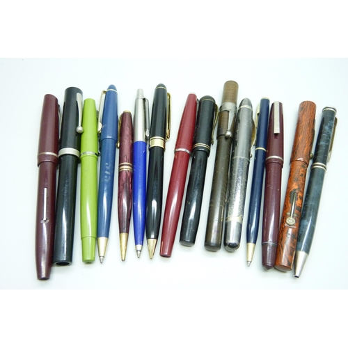 722 - A collection of pens; three with 14ct gold nibs, including Conway Stewart No.479M and The Guinea, an... 