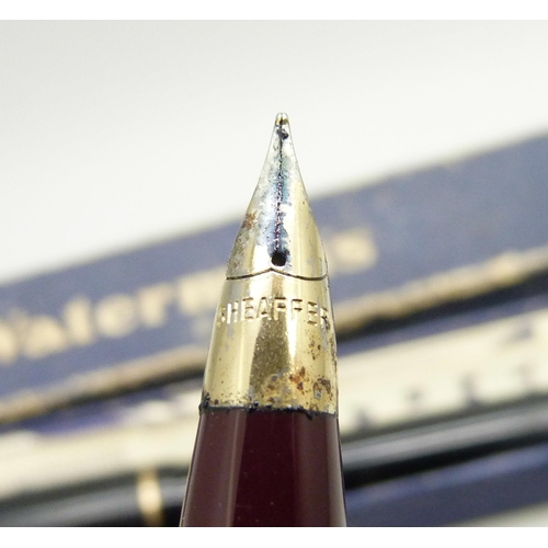 724 - Three Sheaffer pens, a Summit fountain pen, a boxed Watermans fountain pen with 14ct gold nib and a ... 