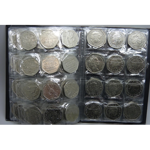 728 - A collection of coins in presentation folder including approximately 90 50p pieces, 20p and 5p