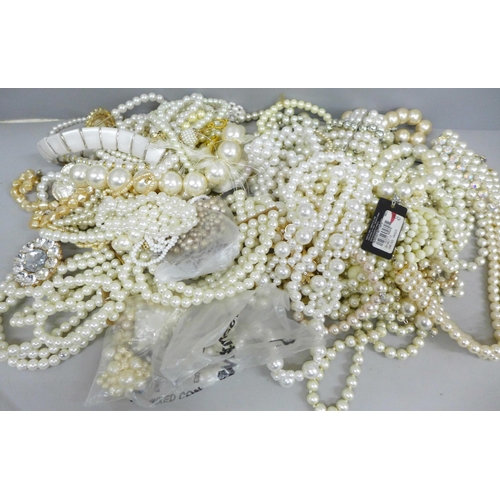 733 - A collection of faux pearls