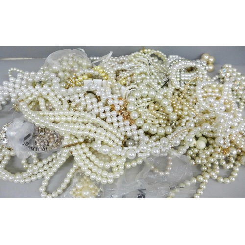 733 - A collection of faux pearls