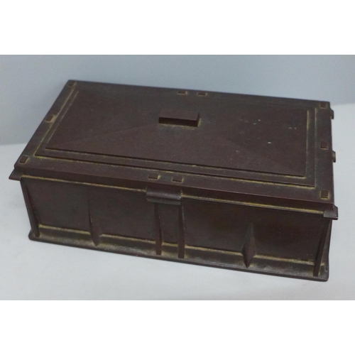 736 - An Arts and Crafts Bakelite box, Elo Ware, 18cm wide