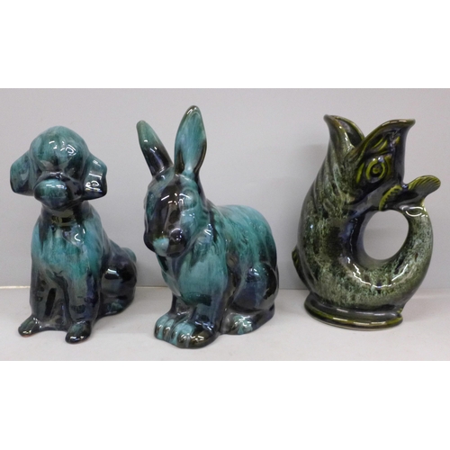 742 - A Fosters Studio Cornish pottery gluggle jug and two blue ceramic mobels of a rabbit and a dog