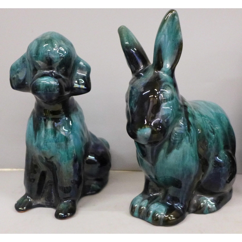 742 - A Fosters Studio Cornish pottery gluggle jug and two blue ceramic mobels of a rabbit and a dog