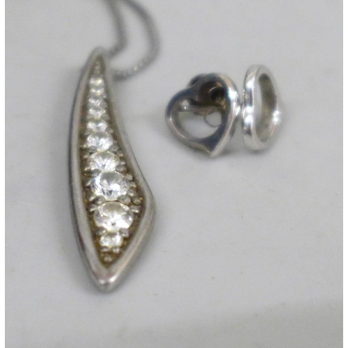 755 - Costume jewellery, a pair of 9k white gold earrings, 1.5g, and silver chain with pendant