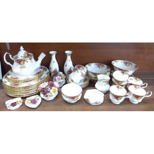 764 - A collection of Royal Albert Old Country Roses, including teapot, seven cups and four saucers, five ... 