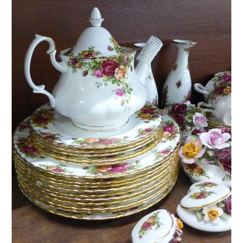 764 - A collection of Royal Albert Old Country Roses, including teapot, seven cups and four saucers, five ... 