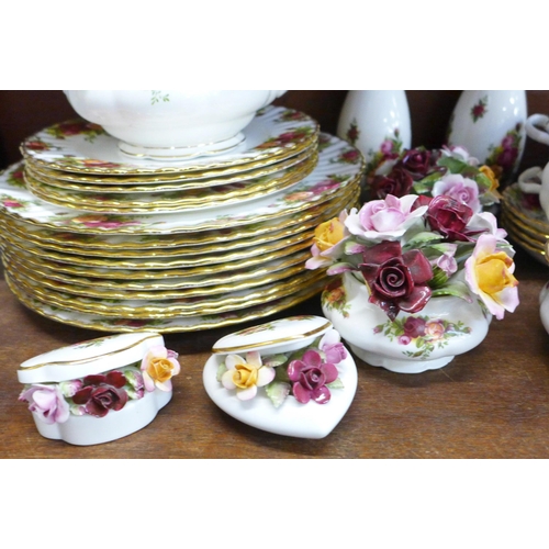 764 - A collection of Royal Albert Old Country Roses, including teapot, seven cups and four saucers, five ... 