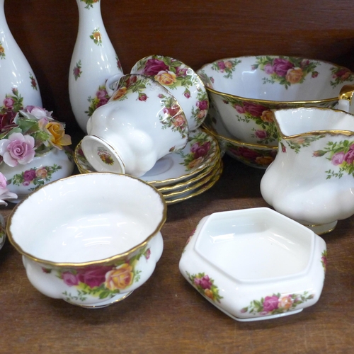 764 - A collection of Royal Albert Old Country Roses, including teapot, seven cups and four saucers, five ... 