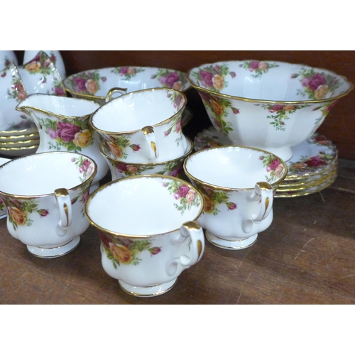 764 - A collection of Royal Albert Old Country Roses, including teapot, seven cups and four saucers, five ... 