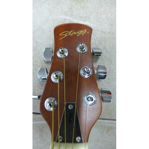 5061 - A Stagg electric guitar and a Rockburn 15G guitar amplifier