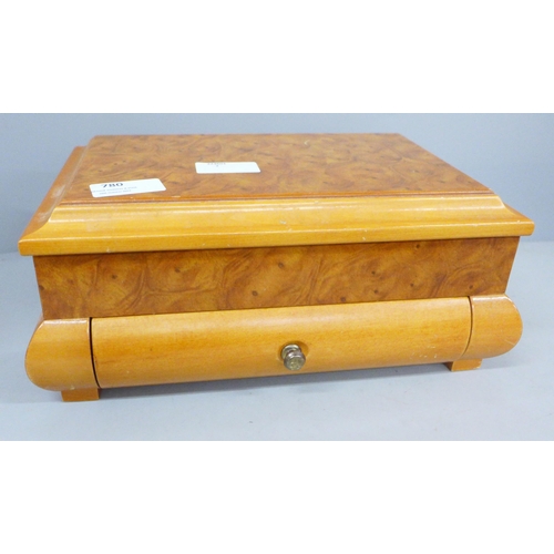 780 - A jewellery box and costume jewellery