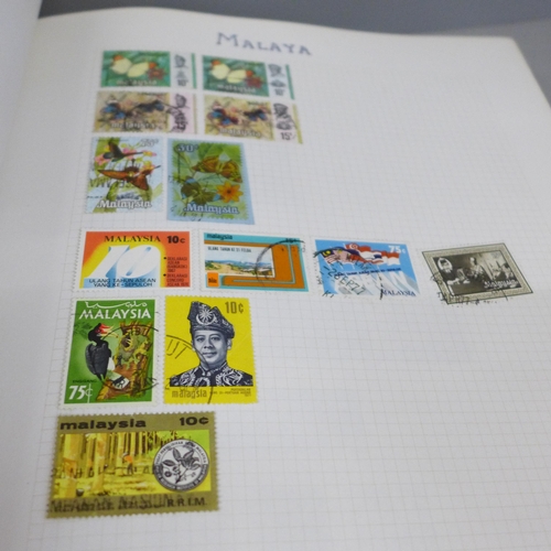 785 - Two albums of worldwide stamps, (part full)