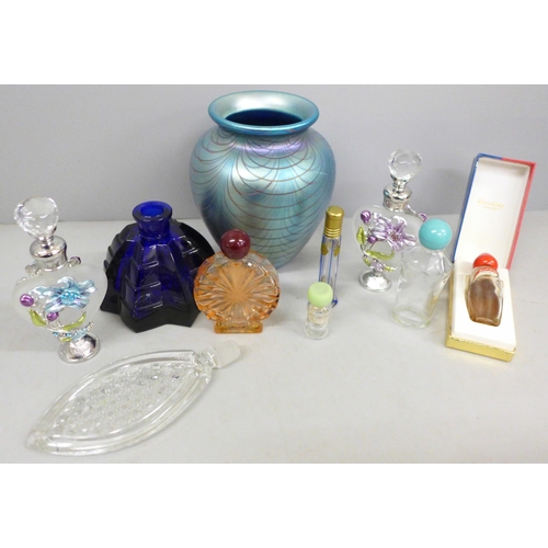 789 - An Okra glass vase and a collection of scent bottles