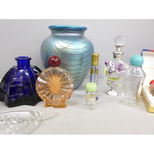 789 - An Okra glass vase and a collection of scent bottles