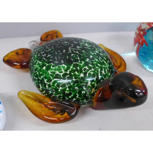 794 - A Juliana Collection glass model of a turtle, boxed, and two glass paperweights