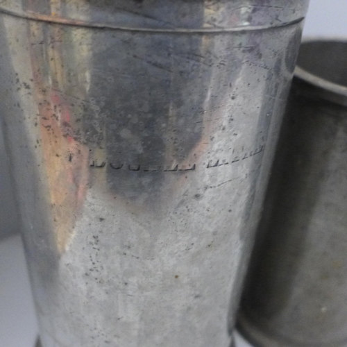 797 - A set of eight pewter tankard measures, largest ‘double litre’ and 23.5cm