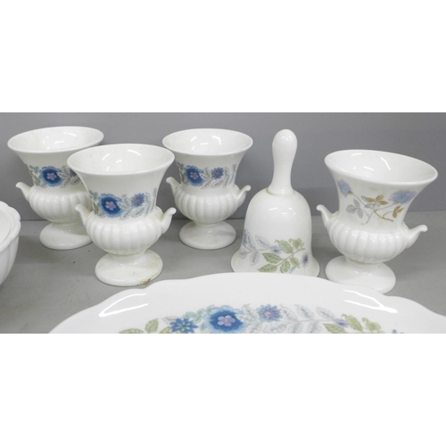 802 - A collection of Wedgwood Ice Rose and Clematine pattern china