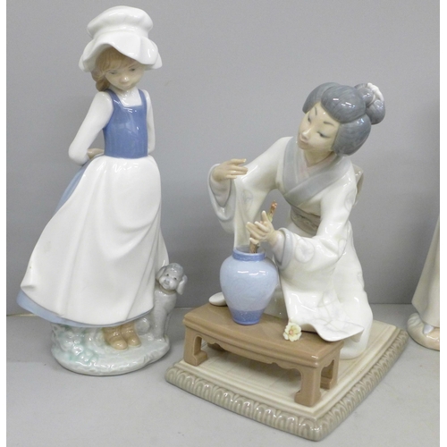 805 - Two Lladro figures and three Nao figures