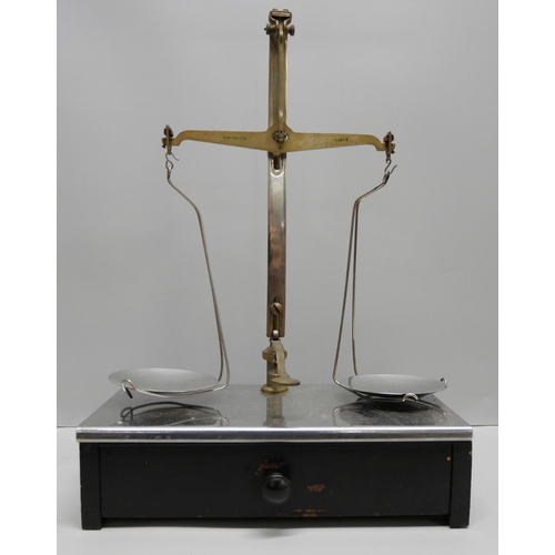 815 - A set of balance scales and a cased set of weights