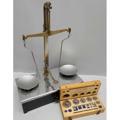 815 - A set of balance scales and a cased set of weights