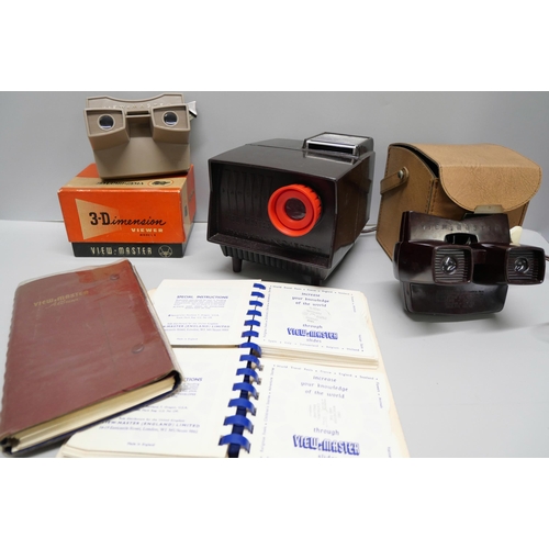 820 - Two View-master 3D viewers, a Sawyers View-master, boxed, and a collection of View-master slides