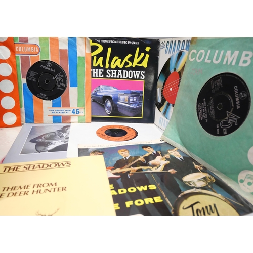 824 - A box of 92 vinyl single records including Cliff Richard, Shadows, etc.