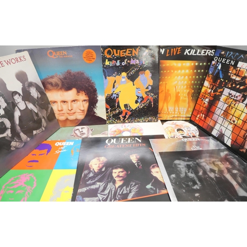 825 - Twelve Queen LP records