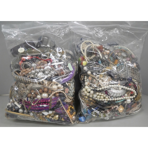 829 - A collection of costume jewellery, (two bags)