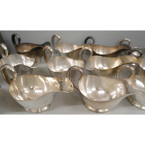 836 - Elkington & Co. silver plated sauce boats and a cream jug