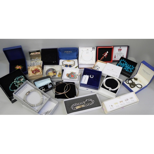 856 - A collection of boxed and packaged costume jewellery